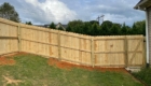 wood privacy fence on slope